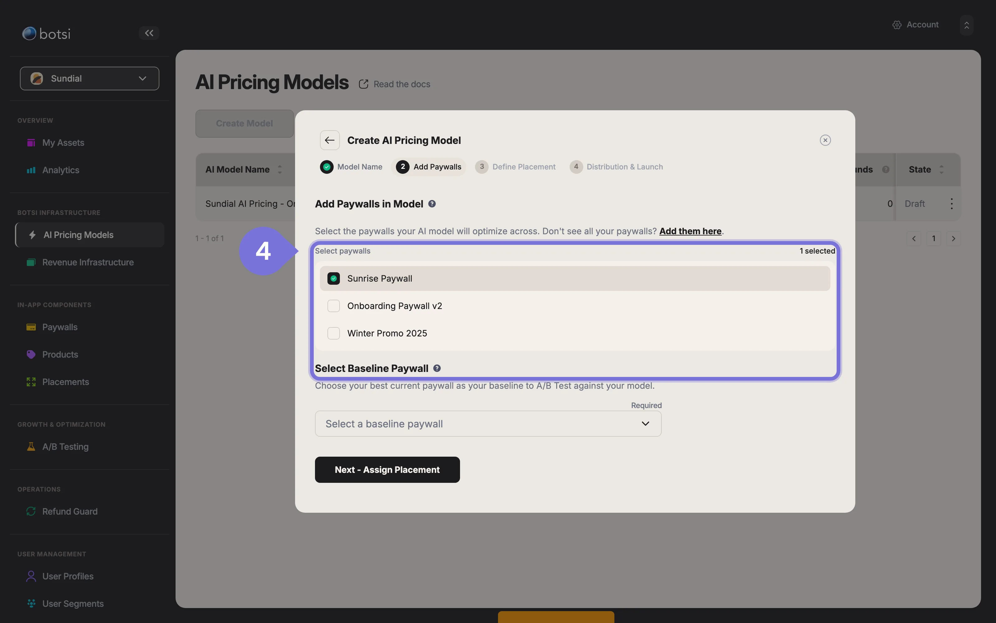Screenshot of Step 2: Add Paywalls in the model creation process. A list of available paywalls is shown with several checkboxes selected, plus a Select Baseline Paywall dropdown.